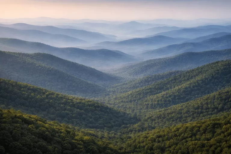 Aerial view of Appalachian Mountains with layered ridges fading into blue haze